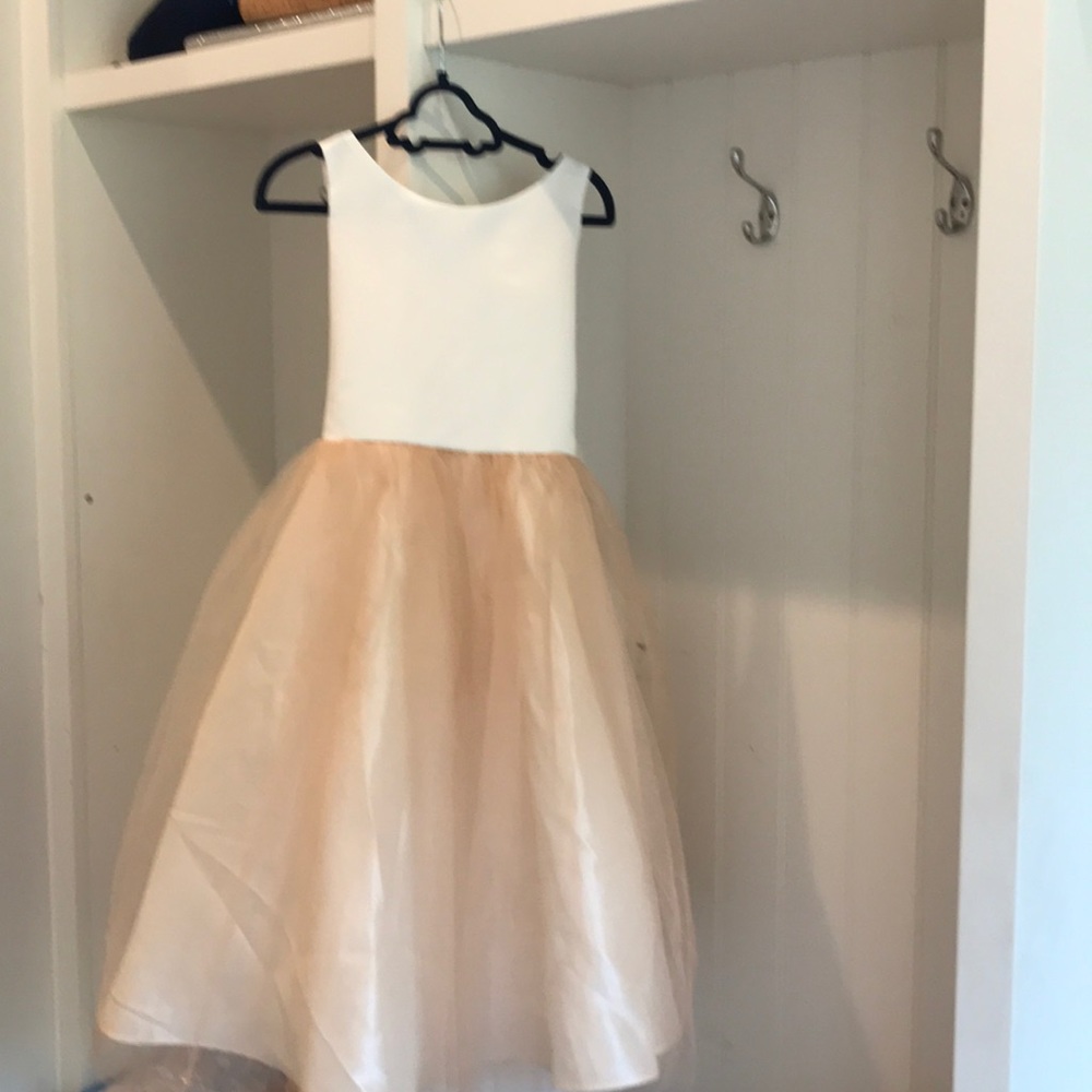 Brand new. With tag petite Adele bridal dress